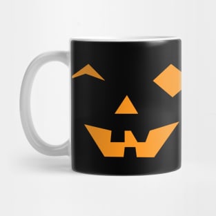 Laughing Halloween Pumpkin Face on Black Background Mug